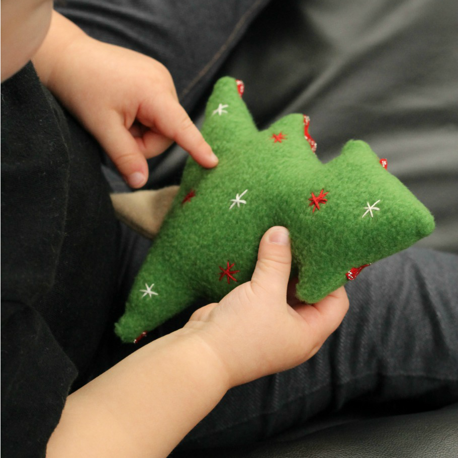 Christmas Tree Softie - a free pattern from Swoodson Says. Sew up a soft holiday tree to snuggle, turn it into a finger puppet, or add a ribbon and make it an ornament!