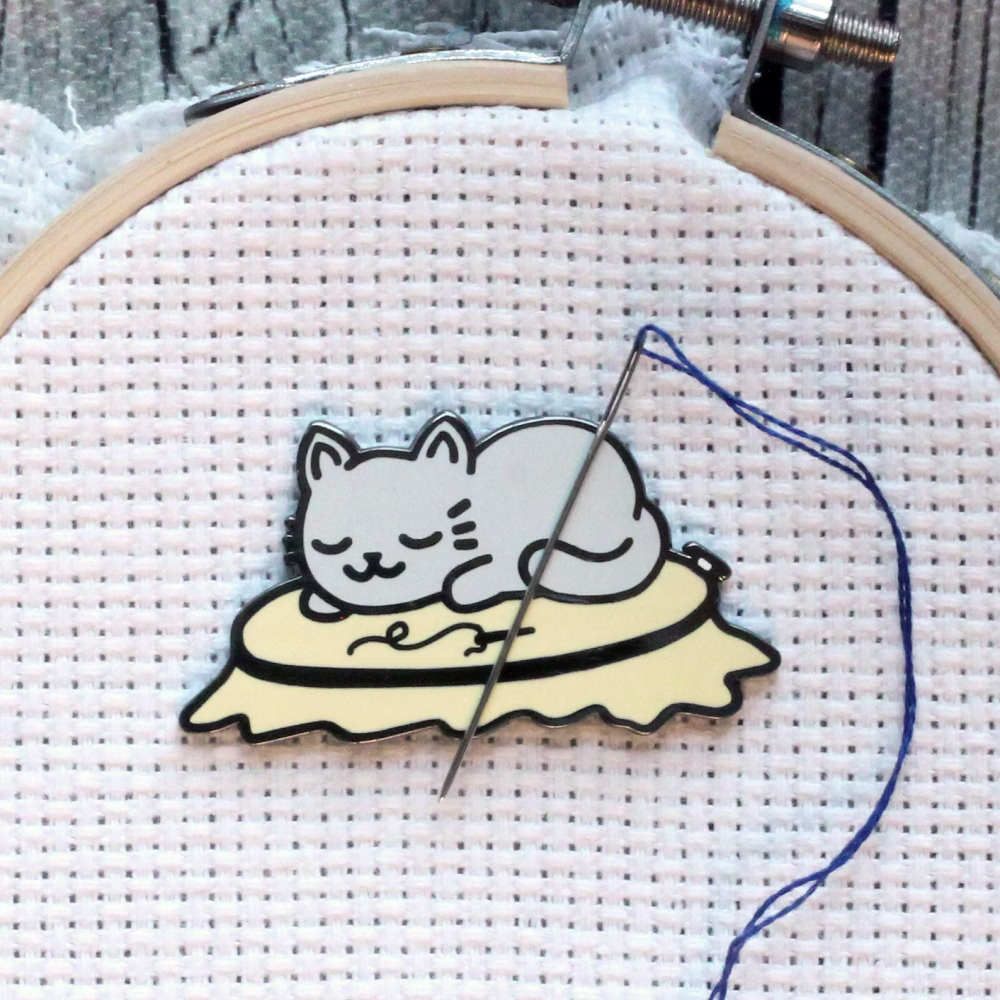 cat needle minder
