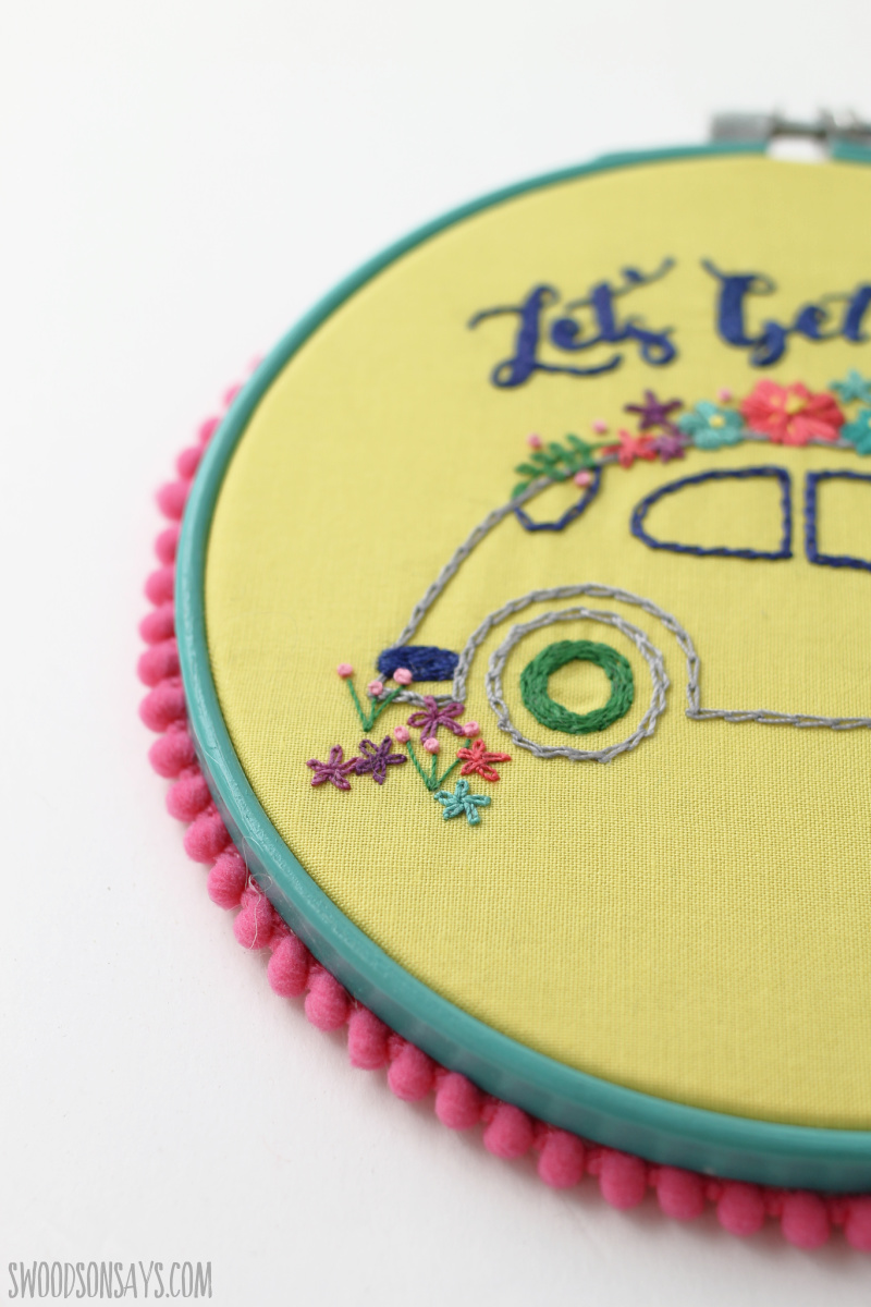 add pom poms to embroidery hoop